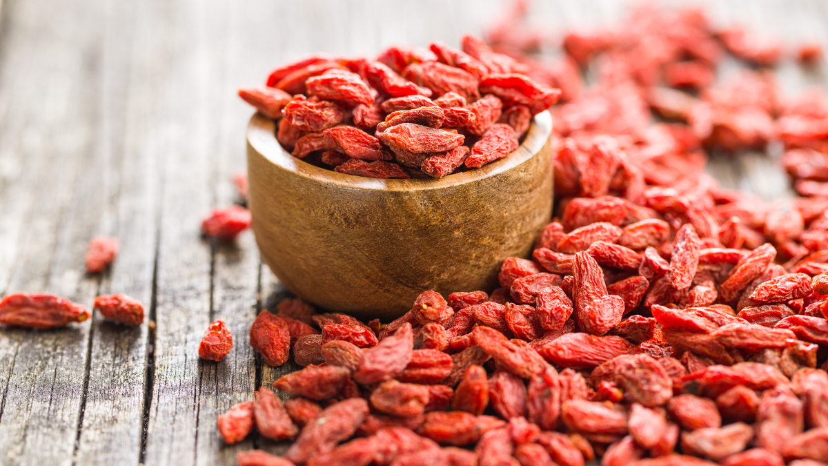 Small bowl of dried goji berries on a table