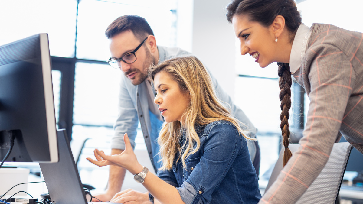 Three employees focusing on an intellectual task