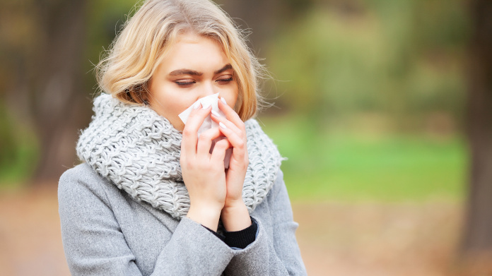 Woman with a cold who has caught a chill